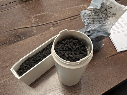 You fill the two odour filters with activated carbon, which should be replaced twice a year.