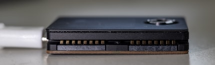 The slot is located on the side of the Oxocard Connect.