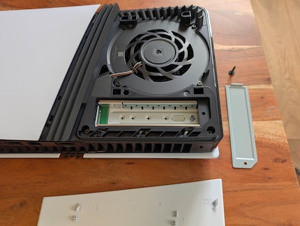 Once the cover’s off, you can insert the SSD.