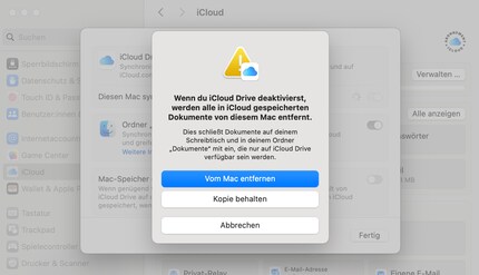 macOS waarschuwt je voor de risico's van het stoppen van de synchronisatie.